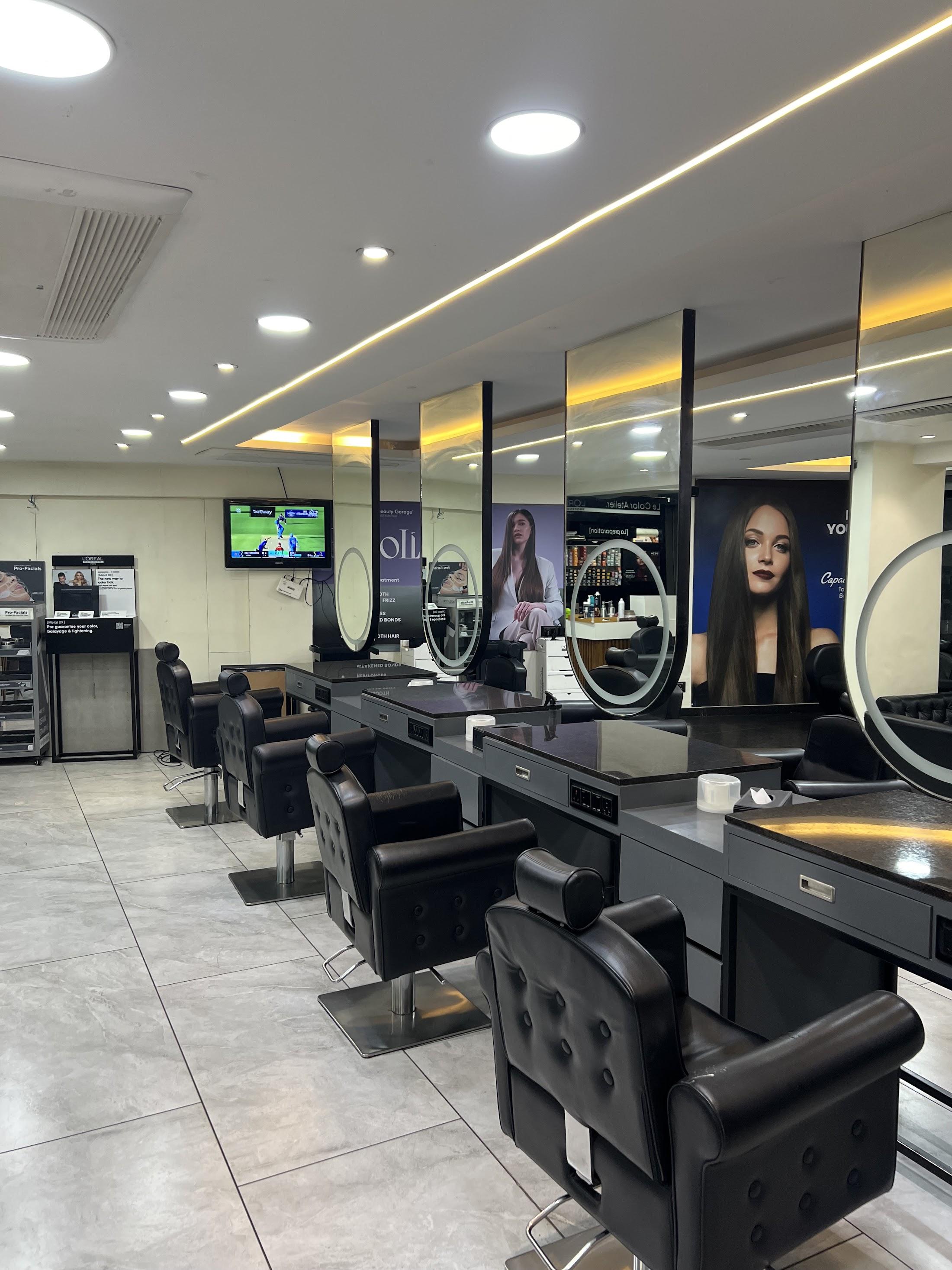 The styling floor with black chairs and mirrors